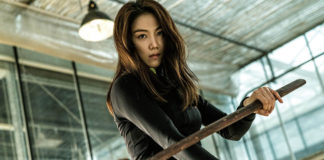 A Vilã une porradaria e vingança Delfos, A Vilã